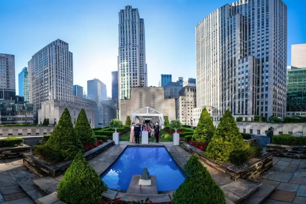 Rooftop wedding ceremony in NYC with skyline views and romantic atmosphere