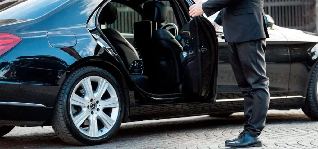 Airport Transfers 4 Chauffeur holded the door open for ride