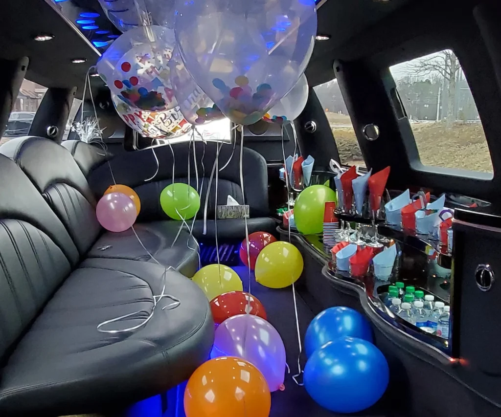Anniversary Transportation 4 Decorated limousine filled with balloons, perfect for anniversary transportation celebrations