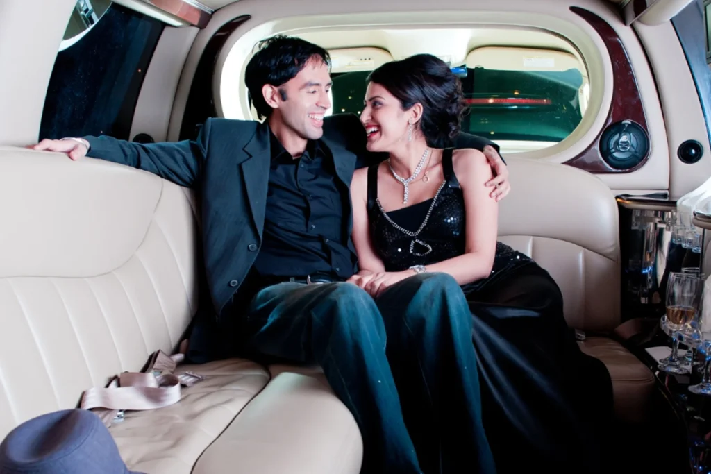 Limousine Packages 4 Man and woman enjoying a romantic moment together in a limousine, on their anniversary