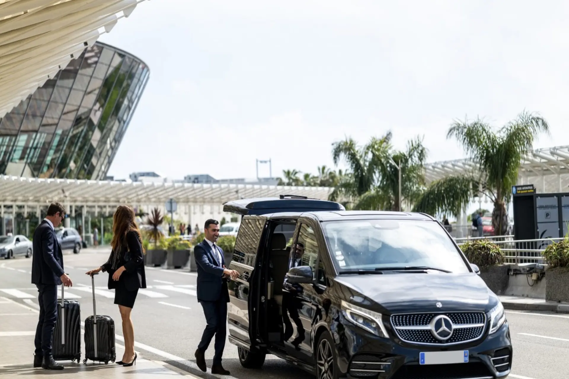 Mercedes-Benz V-Class limousine parked at the airport, ready for luxury transportation services