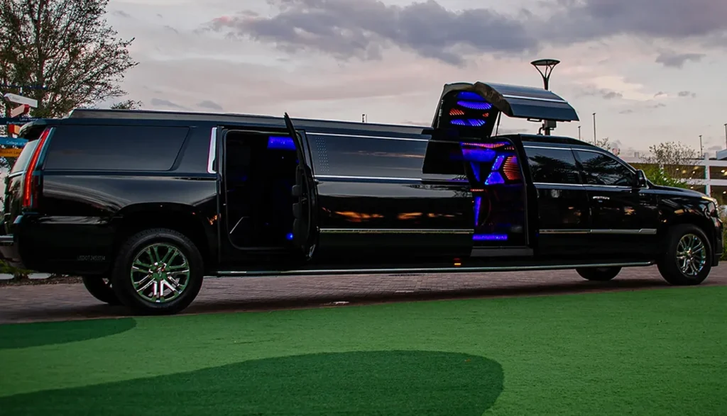 Florida Luxury Limousines vs. Traditional Transportation 4 Black limousine with open doors and illuminated lights, symbolizing stress-free travel experiences