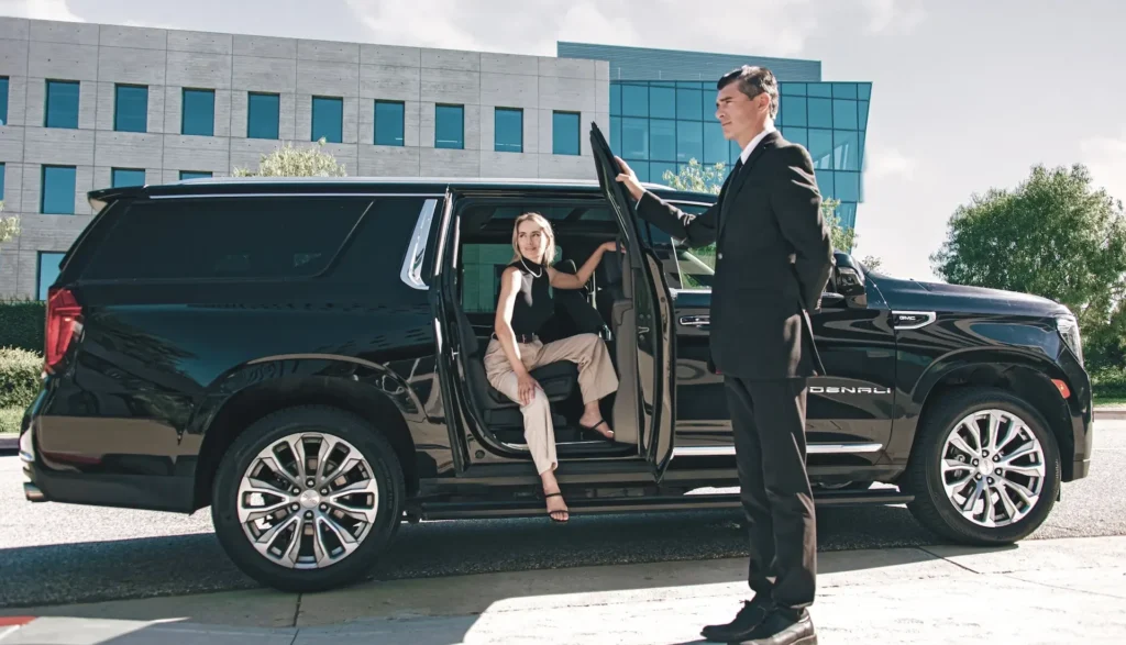 Articles 45 Woman stepping into a black SUV, highlighting a top-tier car service in Los Angeles